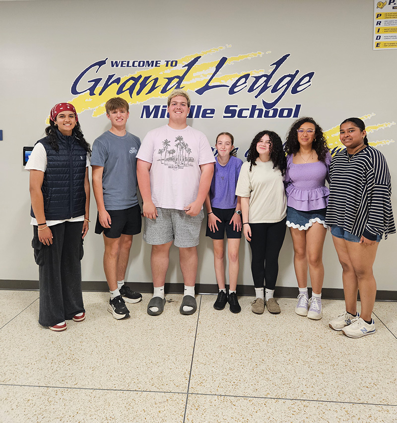 Past and present Ev Effect Pay-It-Forward Grant recipients at Grand Ledge Beagle Middle School